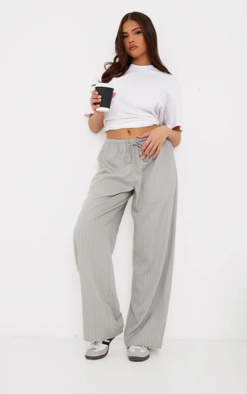 Pale Grey Pinstripe Woven Drawstring Waist Low Rise Relaxed Trousers sold by Pretty Little Thing