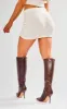 Petite Cream Boucle Mini Skirt sold by Pretty Little Thing