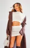 Petite Cream Boucle Mini Skirt sold by Pretty Little Thing