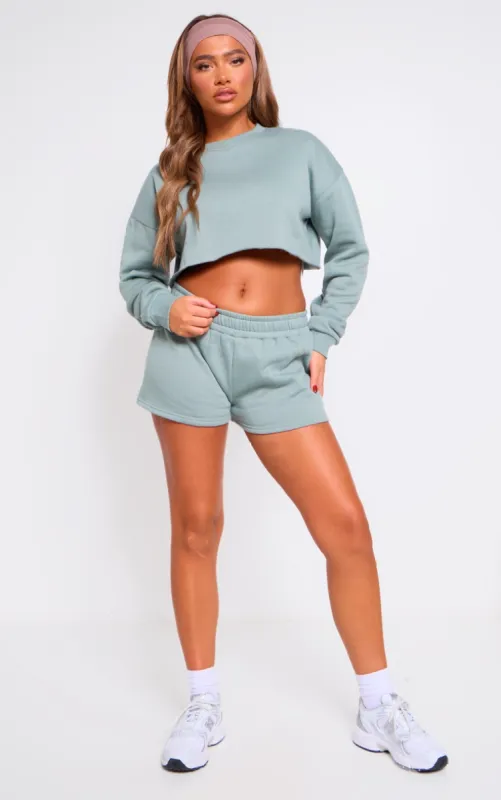 Sage Khaki Drawstring Mini Low Rise Sweat Shorts sold by Pretty Little Thing