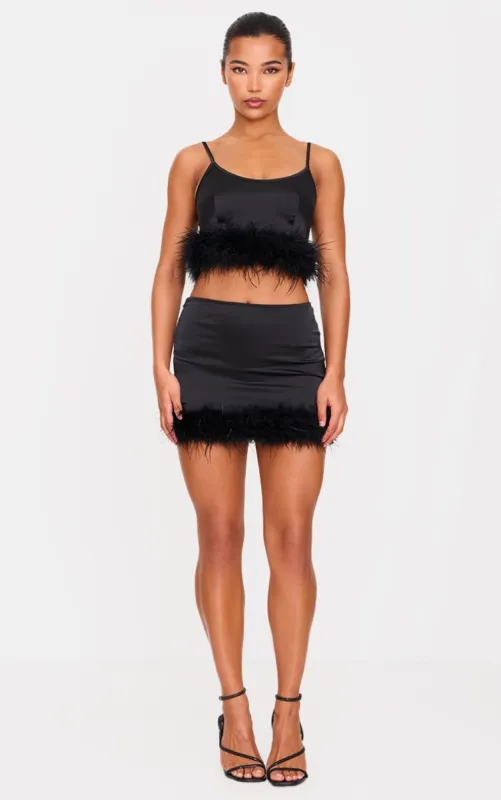 Black Textured Satin Feather Trim Mini Skirt sold by Pretty Little Thing