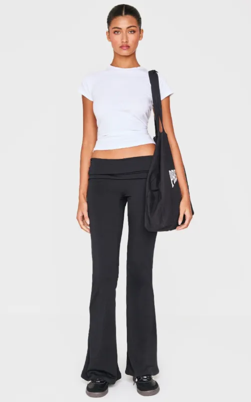 Black Contour Jersey Foldover Waist Ruched Side Flared Trousers sold by Pretty Little Thing