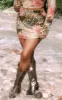 Plus Green Leopard Print Mesh Mini Skirt sold by Pretty Little Thing