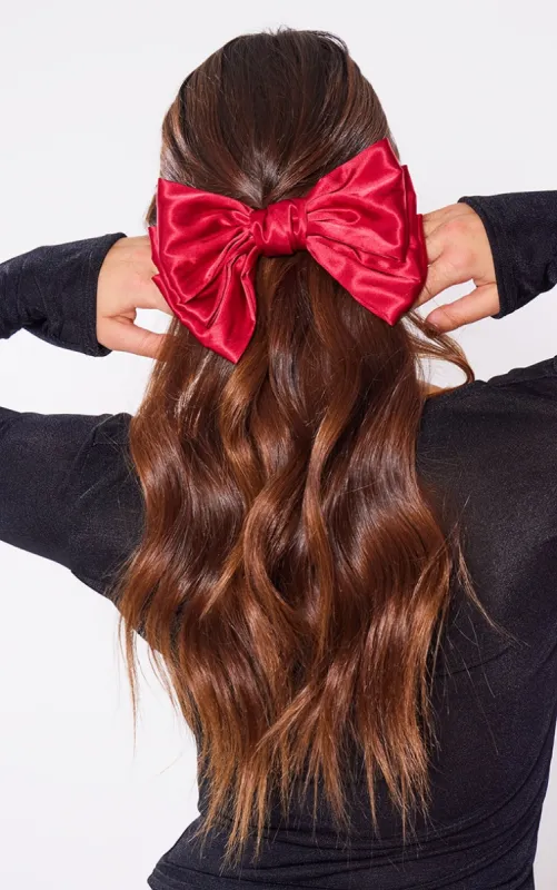 Red Satin Bow Hair Clip sold by Pretty Little Thing