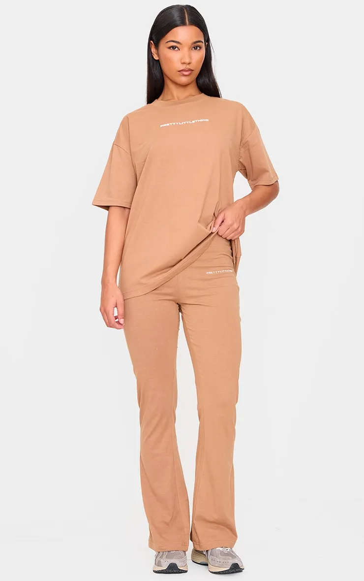 PRETTYLITTLETHING Mocha Printed Flared Trousers sold by Pretty Little Thing