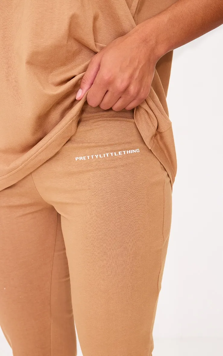 PRETTYLITTLETHING Mocha Printed Flared Trousers sold by Pretty Little Thing product image thumbnail 4