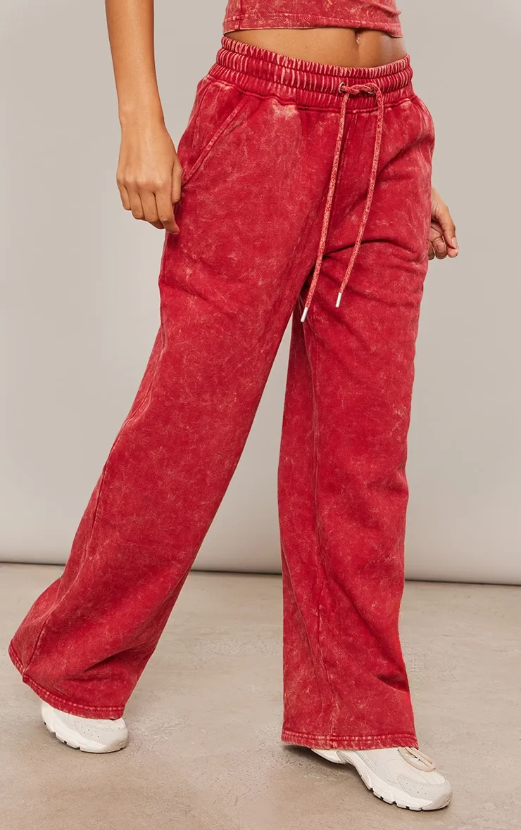 Red Washed Oversized Low Rise Wide Leg Joggers sold by Pretty Little Thing