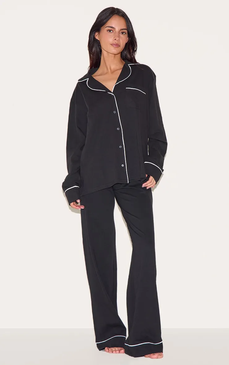 Black Oversized Jersey Piping Detail Long PJ Set, Black sold by Pretty Little Thing