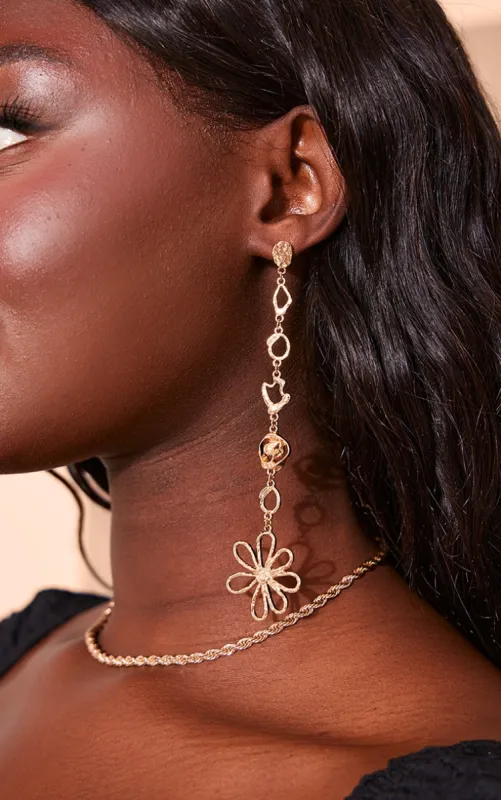 Gold Abstract Daisy Drop Statement Earrings sold by Pretty Little Thing