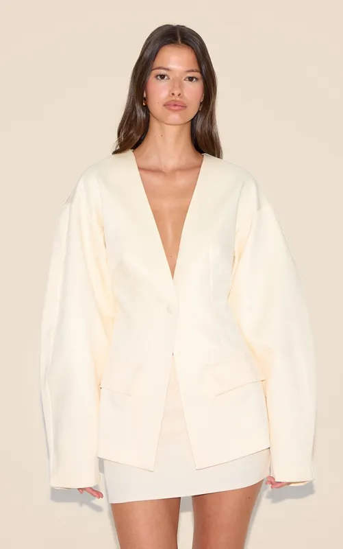 Ecru Cocoon Sleeve Cinched Waist Pocket Blazer sold by Pretty Little Thing