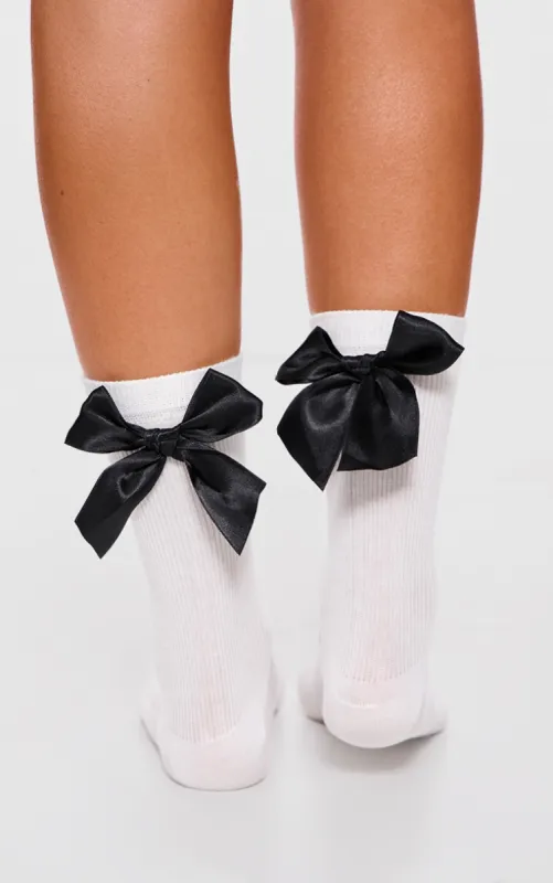 Monochrome Satin Bow Ribbed Ankle Socks sold by Pretty Little Thing