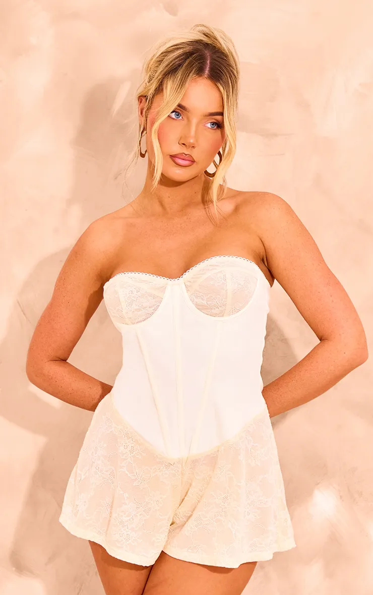 Cream Satin Corset Detail Lace Playsuit sold by Pretty Little Thing
