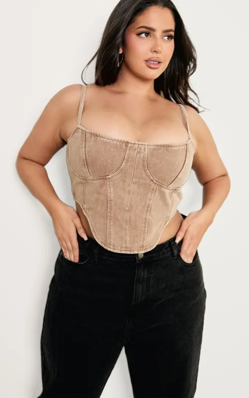 Plus Brown Washed Denim Dipped Hem Corset Top sold by Pretty Little Thing