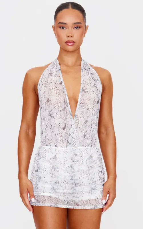 Ash Grey Snake Print Scarf Detail Skort Playsuit sold by Pretty Little Thing