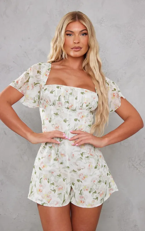 Multi Floral Print Chiffon Ruched Bust Playsuit sold by Pretty Little Thing