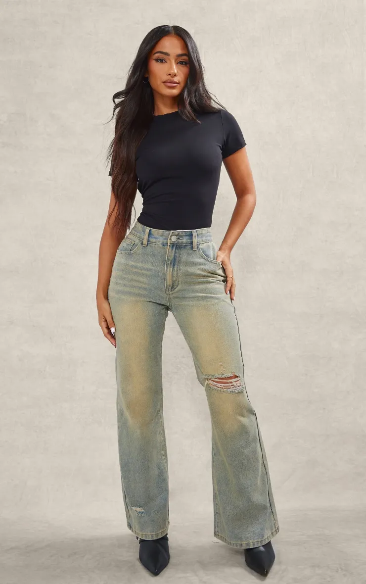 Petite Vintage Mid Wash Distressed Rip Straight Leg Jeans sold by Pretty Little Thing