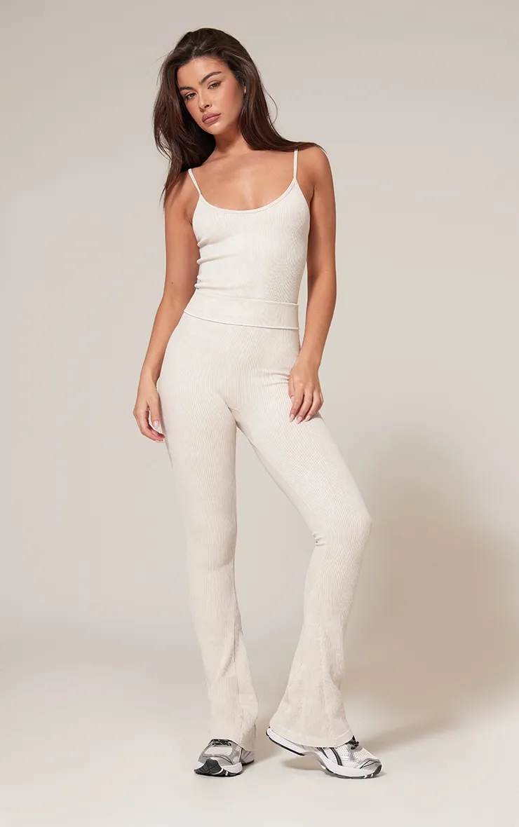 Cream Faded Contour Rib Flared Folded Waist Trousers sold by Pretty Little Thing