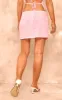Pink Ruched Draped Mini Skirt sold by Pretty Little Thing