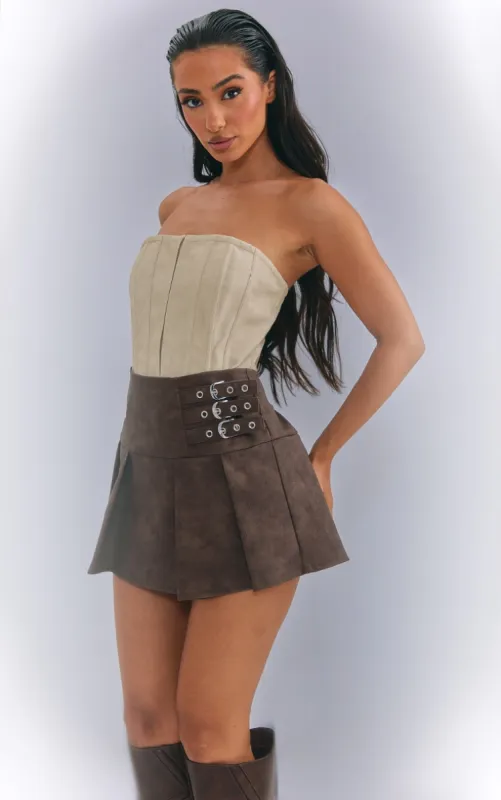 Petite Brown Washed Micro Mini PU Pleated Skirt sold by Pretty Little Thing