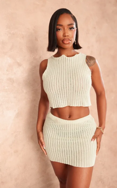 Shape Cream Textured Sheer Sleeveless Crop Top sold by Pretty Little Thing