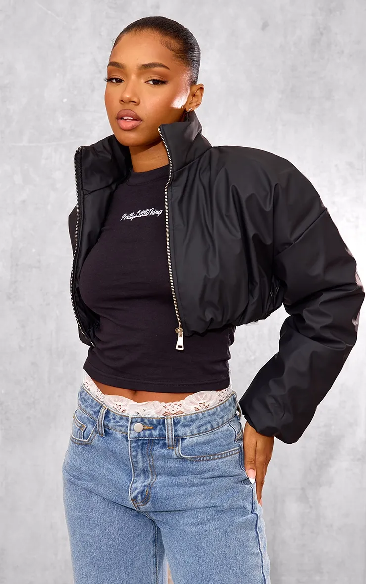 Black Wax Look Zip Up Cropped Puffer Coat sold by Pretty Little Thing