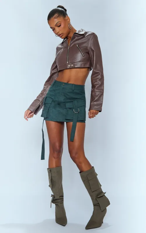 Green Washed Faux Leather Pocket Cargo Mini Skirt sold by Pretty Little Thing