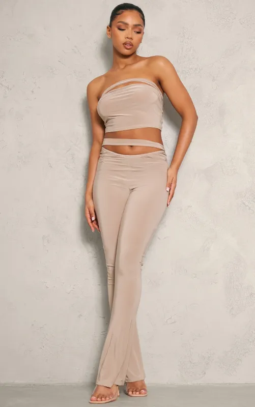 Stone Slinky Cutout Foldover Skinny Flare Trousers sold by Pretty Little Thing