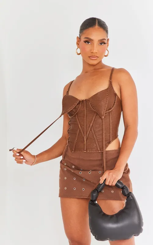 Brown Washed Faux Leather Under Wire Seam Detail Corset sold by Pretty Little Thing