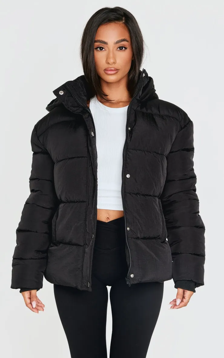 Petite Black Hooded Puffer Jacket sold by Pretty Little Thing