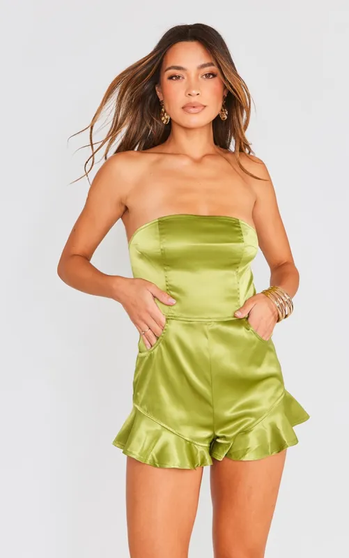Olive Satin Frill Leg Bandeau Playsuit sold by Pretty Little Thing