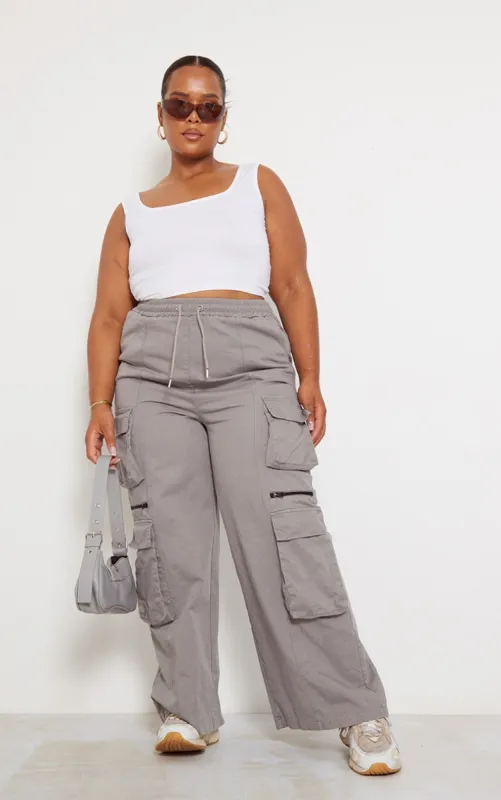 Plus Grey Washed Cargo Trousers sold by Pretty Little Thing