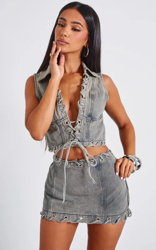 Petite Washed Grey Denim Lace Up Crop Top sold by Pretty Little Thing
