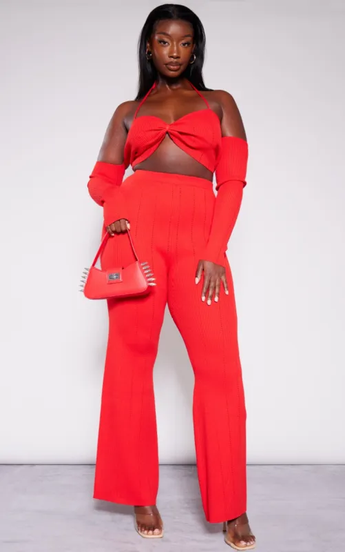 Plus Red Rib Knit Flared Trousers sold by Pretty Little Thing