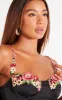 Black Satin Floral Applique Underwired Strappy Maxi Dress sold by Pretty Little Thing