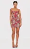 Burgundy Tapestry Bandeau Lace Up Back Bodycon Dress sold by Pretty Little Thing
