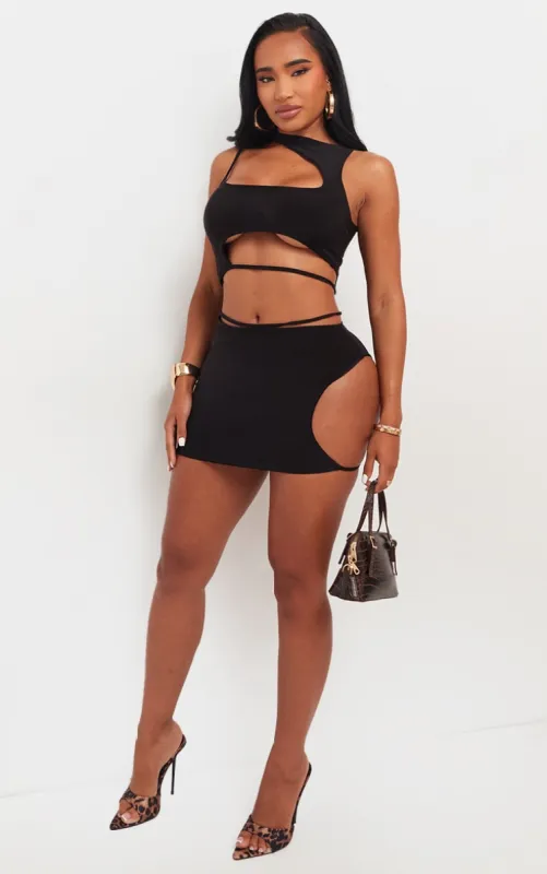 Shape Black Slinky Cut Out Mini Skirt sold by Pretty Little Thing