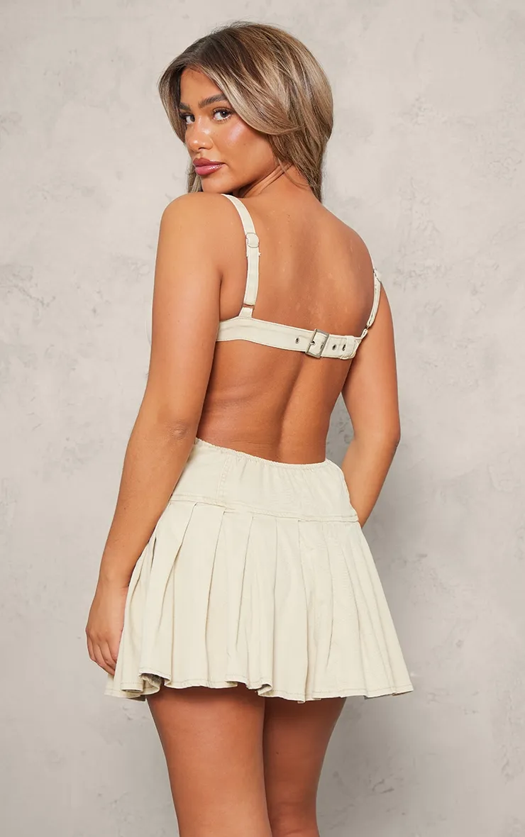 Washed Stone Cut Out Side Pleated Denim Mini Dress sold by Pretty Little Thing product image thumbnail 2