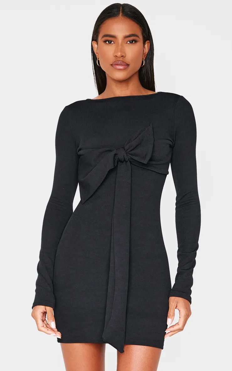 Black Long Sleeve Bow Detail Mini Dress sold by Pretty Little Thing