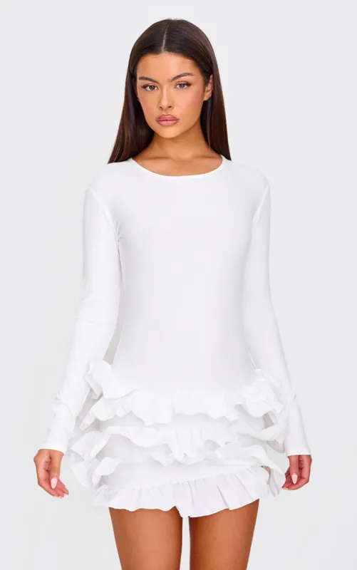 Cream Ribbed Long Sleeve Frill Mini Dress sold by Pretty Little Thing