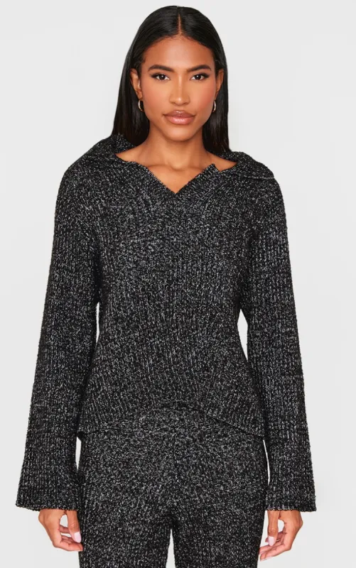 Black Marl Knit V Neck Oversized Jumper sold by Pretty Little Thing