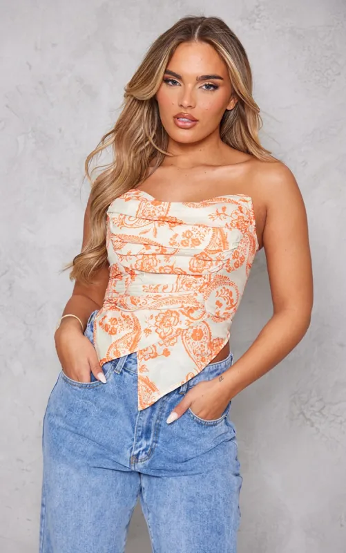 Orange Paisley Print Woven Asymmetric Pointed Hem Corset sold by Pretty Little Thing