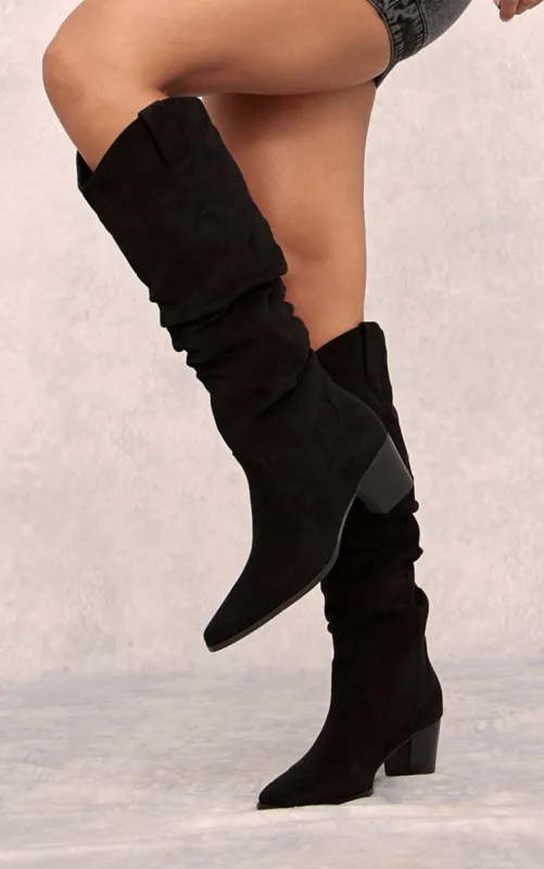 Black Faux Suede Point Toe Ruched Knee High Heeled Western Boots sold by Pretty Little Thing