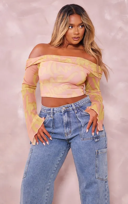 Shape Pink Graffiti Printed Mesh Bardot Long Sleeve Crop Top sold by Pretty Little Thing