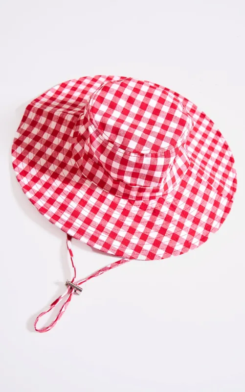 Red Gingham Toggle Bucket Hat sold by Pretty Little Thing