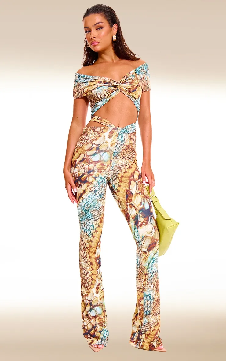 Multi Abstract Snake Print Double Layer Slinky Twist Flare Trousers sold by Pretty Little Thing
