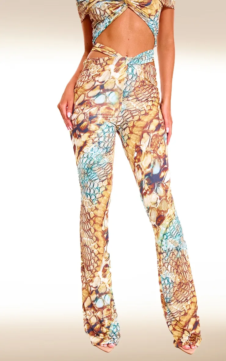 Multi Abstract Snake Print Double Layer Slinky Twist Flare Trousers sold by Pretty Little Thing product image thumbnail 2