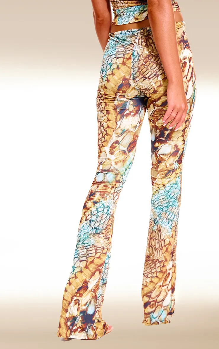 Multi Abstract Snake Print Double Layer Slinky Twist Flare Trousers sold by Pretty Little Thing product image thumbnail 3