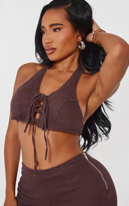 Shape Brown Denim Halterneck Lace Up Front Crop Top sold by Pretty Little Thing