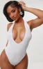 Shape White Ribbed Halterneck Plunge Bodysuit sold by Pretty Little Thing