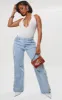 Shape White Ribbed Halterneck Plunge Bodysuit sold by Pretty Little Thing